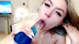 Busty Blonde Loves To Deepthroat Big Dildos