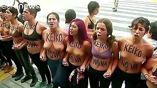 Topless Protesters Clash With Police In Peru