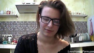 Solo Girl With Glasses Chatting In The Kitchen