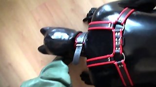 Rubber Puppy Play In Rubber Waders