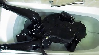 Rubber Girl In The Bath.