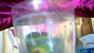 Cumshots In Water Glass Close-up Sperm