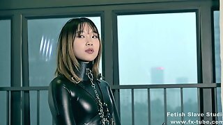 Bondage Leather Catsuit Girl On Single Gloves