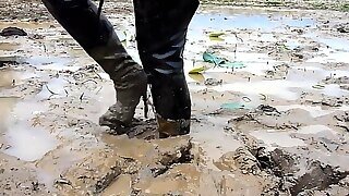 Two Thai In Thigh Boots Swim In Mud!!!