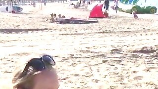 Beach Babe Oiling Her Big Natural Tits