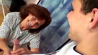 Youthful Customer Pokes Sewing Granny