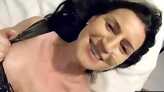 Attractive Dark Hair Cougar Sucking A Penis